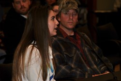 Lamar Heidersheid looks on as his daughter Angelina speaks before the Native Amerian Commission - photo by C.S. Hagen