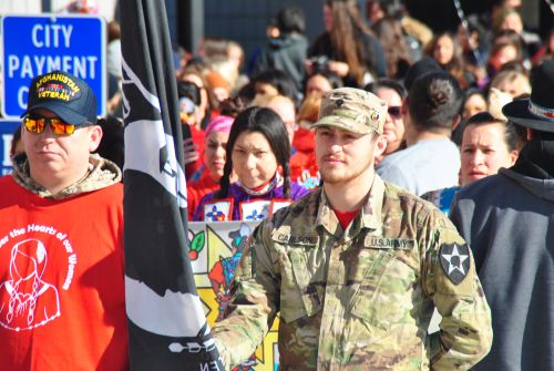Marchers, led by the Desert Era Veterans, prepare to walk downtown Fargo - photograph by C.S. Hagen