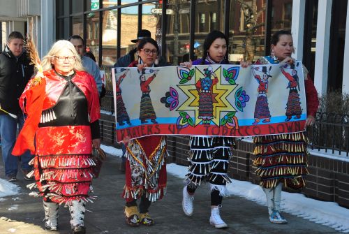 Marchers through downtown Fargo - photograph by C.S. Hagen