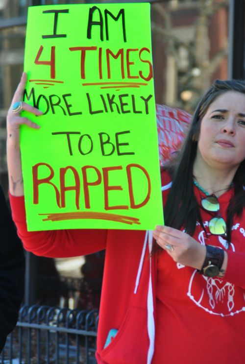 More signs during march - photograph by C.S. Hagen
