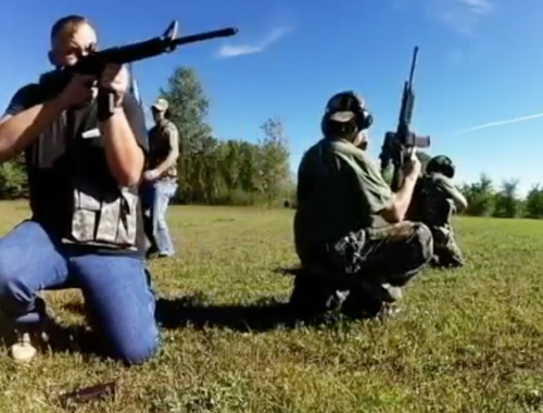 Members of the North Dakota Security Force III% practicing at targets before blowing up mosque replica - video snapshot