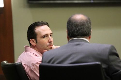 William Henry Hoehn and his lawyer discussing tactics after Crews's testimony - photograph by C.S. Hagen