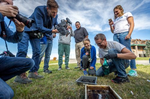 Greta Thunberg and wet plate photographer Shane Balkowitsch waiting for the wet plate magic - photograph by Chad Nodland